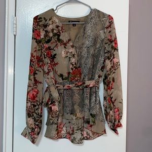 Never worn! Size small blouse with unique‎ floral and animal print.